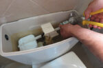 repairing toilet float
